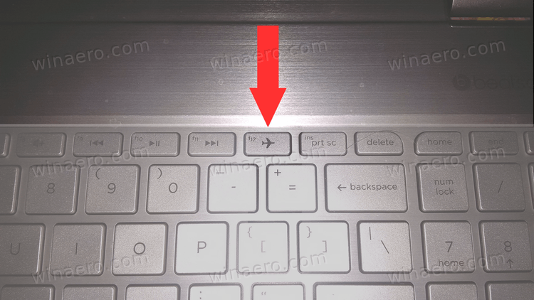 Airplane Mode Button On The Dell Laptop Keyboard With Arrow