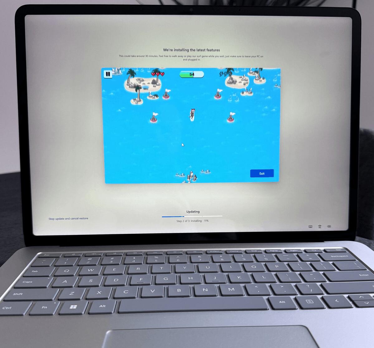 Windows 11 Installing Updates Surf Game
